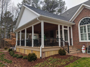 Outside view of a deck before the conversion to an enclosed space